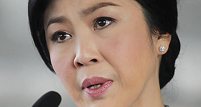 Teary-eyed Yingluck won't resign, PDRC maintains pressure