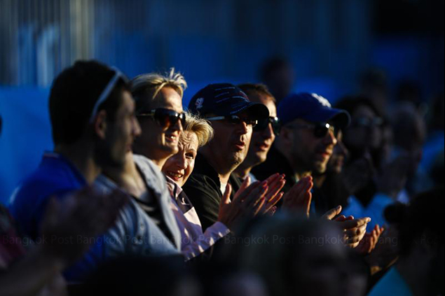Spectators watch a first-round match at the Australian Open Grand Slam tennis tournament in Melbourne. — EPA