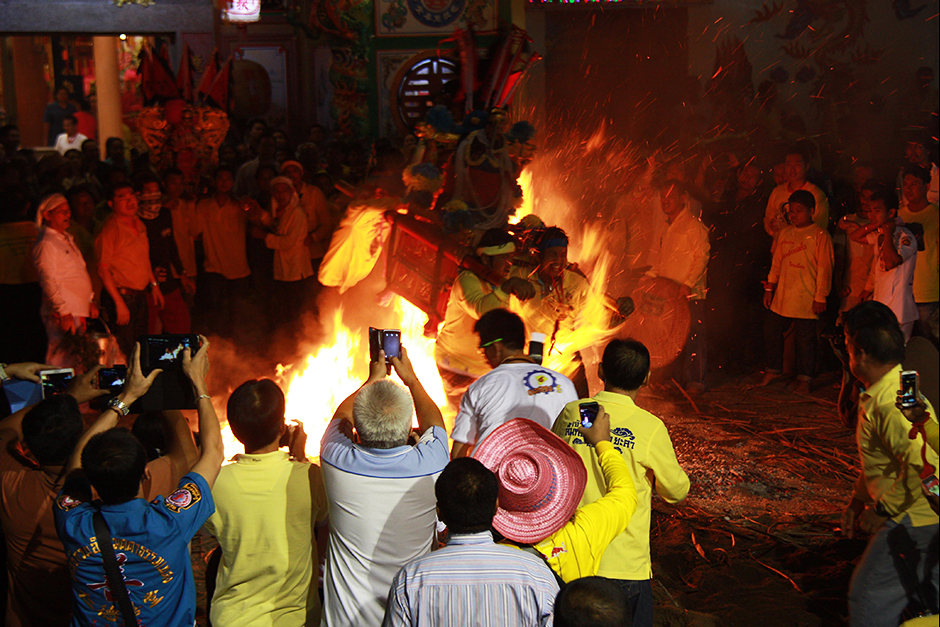 A fire-walking ritual is held in front a shrine in the southern province of Yala. The ceremony, to worship a Chinese goddess, has been performed for over 70 years. — Maluding Deeto