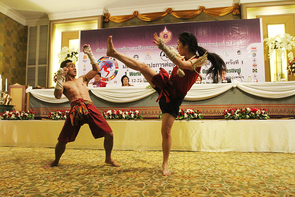 Muay Thai fighters perform give a demonstration at a press conference for the World Martial Arts Council Games 2015 at a Bangkok hotel. The festival will take place at the Indoor Stadium Hua Mak from March 12 to 22. — Pornprom Satrabhaya