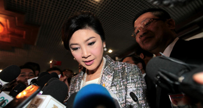 Yingluck free to travel, if she asks