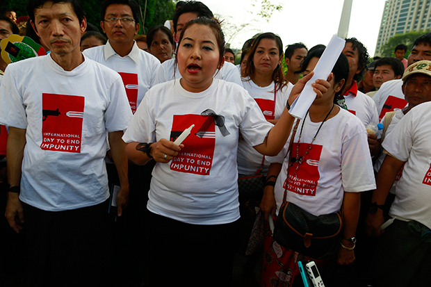 A journalist gives a speech against her colleagues being either killed or imprisoned during the course of their work during a protest to mark World Impunity Day at Sule Pagoda in Yangon Nov 2. Despite dramatic changes since 2011, journalists are increasingly being arrested and imprisoned. (Reuters photo)