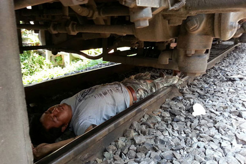 Bangkok Post Suicidal man jumps in front of train, but survives