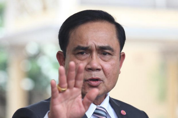 Immediately after police sources revealed they had evidence that an army major general was involved in human trafficking, flat denials came from the military command and from Prime Minister Prayut Chan-o-cha. (Photo by Thiti Wannamontha)