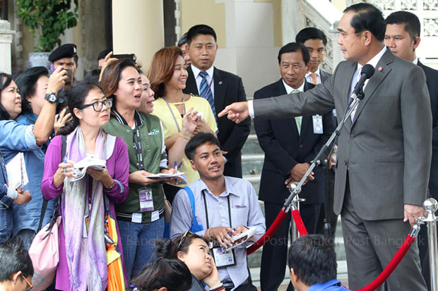 Prime Minister Prayut Chan-o-cha takes questions from reporters at Government House on Wednesday during which he said he ordered the national police chief to end his casino campaign. (Photo by Thanarak Khunton)