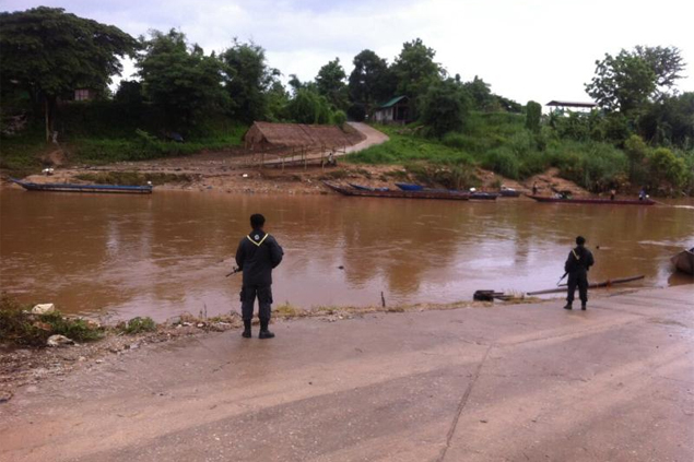 Too close for comfort: Thai rangers guard the border after fighting between Myanmar's military and a KNU splinter group. Too close for comfort: Thai rangers guard the border after fighting between Myanmar's military and a KNU splinter group.