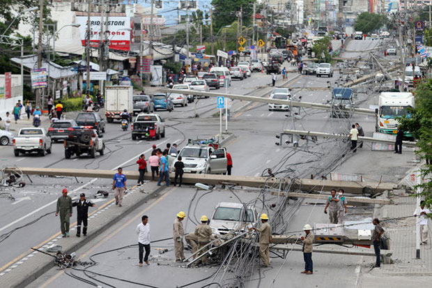 Truck topples 47 power poles