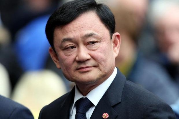 Thaksin set to lose police rank