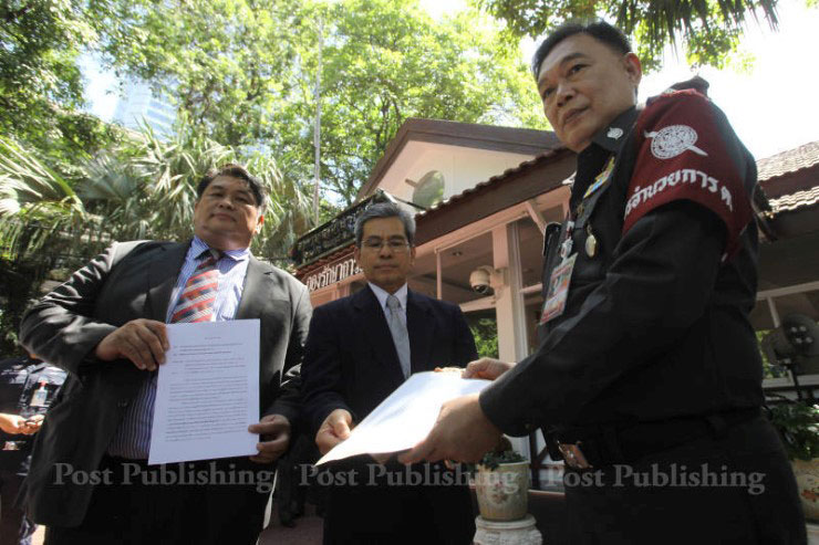 Lawyer seeks lese majeste charge against Prayut