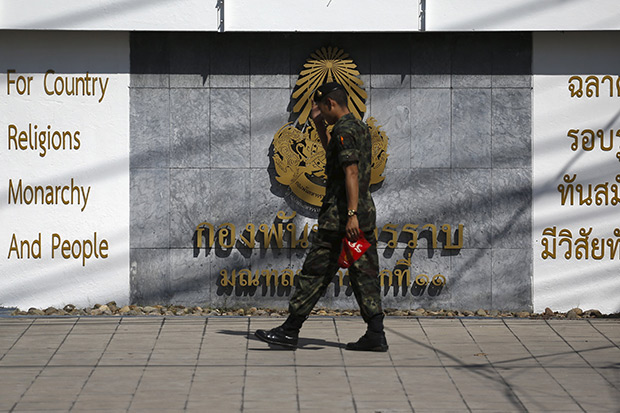 A soldier walks outside the 11th Army Circle base in Bangkok, which rights activists now liken to Thailand’s own “black site” to detain suspects in a range of crimes deemed to be against national security. (Reuters photo)