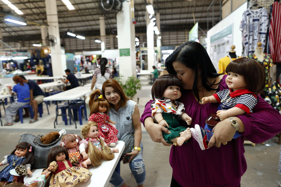 Ms Ratchada continues to show her affection for her Child Angel dolls.