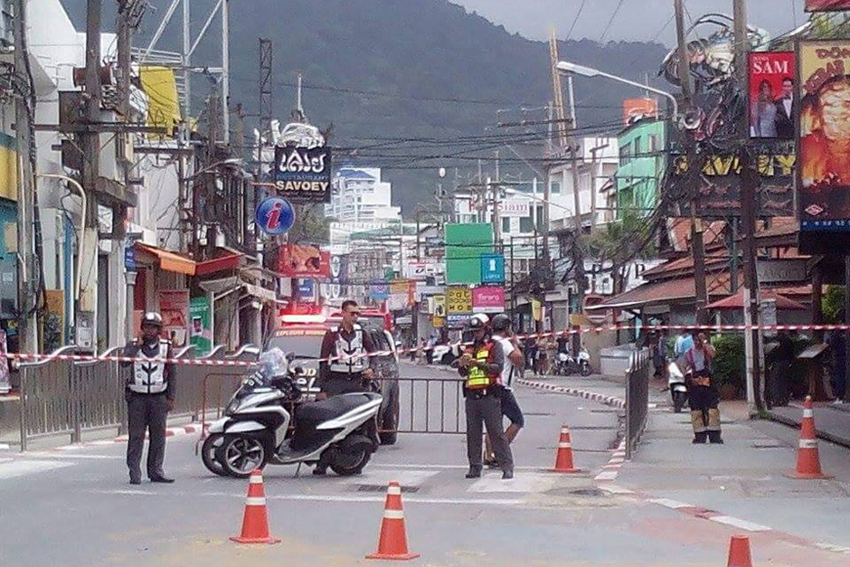 In Phuket's Patong district, a bomb explodes at a police booth at the end of Walking Street Road. - Achadtaya Chuenniran