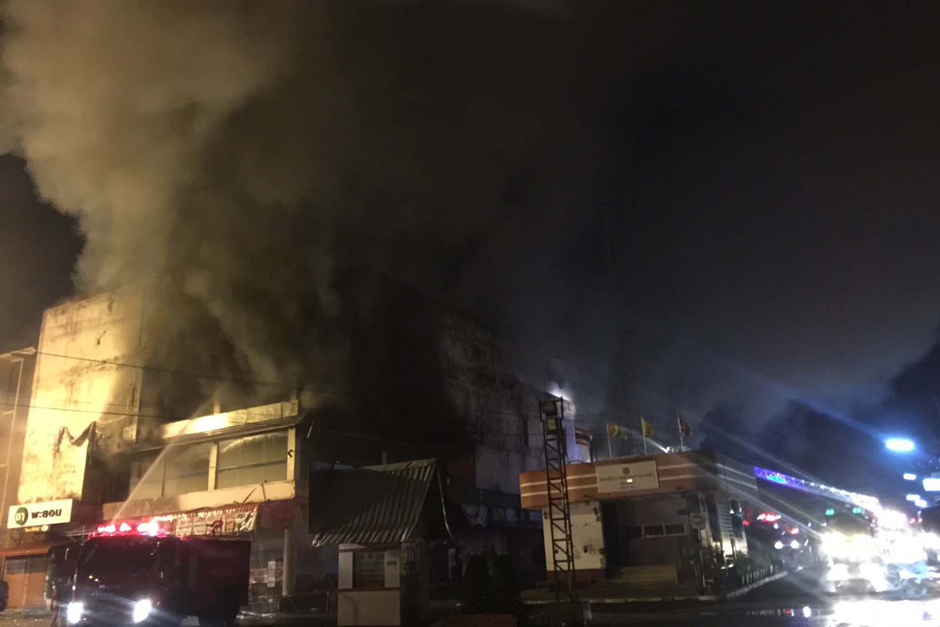 A fire causes major damage at a local department store in Trang. - Methee Muangkaew