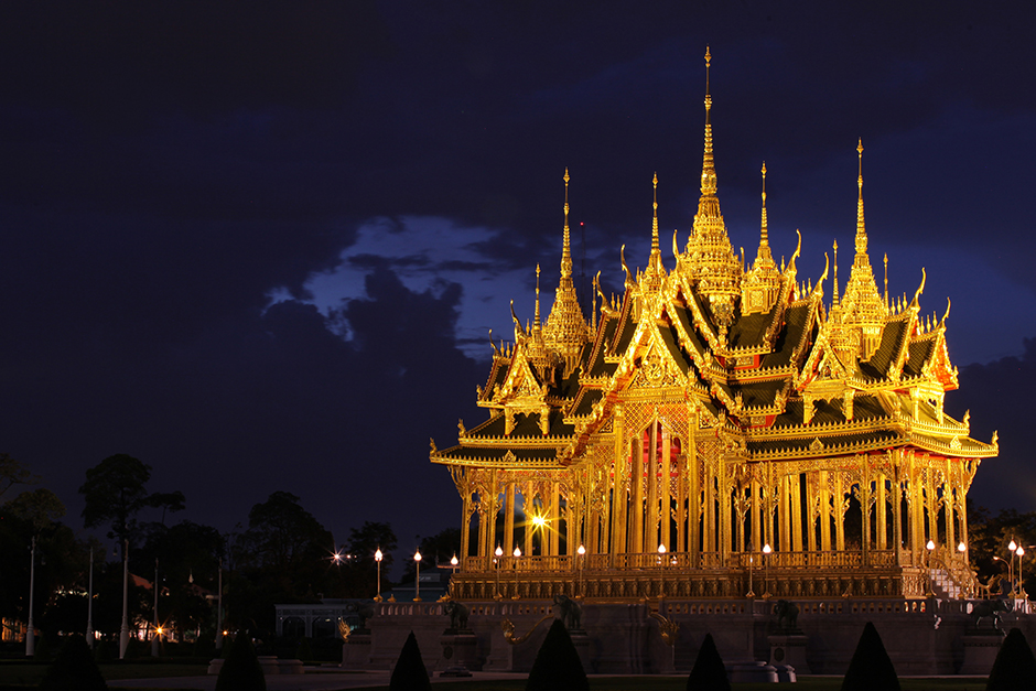 The Ruen Yod Barom Mungkalanusaranee pavilion glows as it is lit up against the evening sky close to the Ananta Samakhom Throne Hall. The pavilion was built to honour important events associated with the royal family. - Wichan Charoenkiatpakul