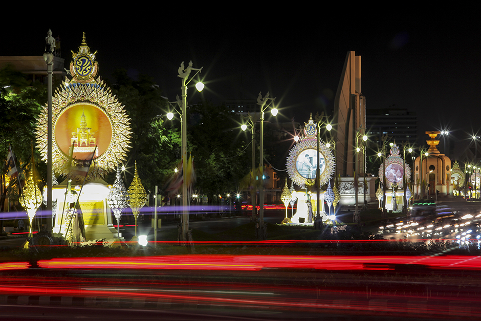 Decorations light up the night on Ratchadamnoen Avenue. - Wichan Charoenkiatpakul