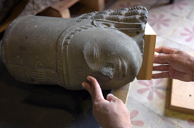 French museum returns looted statue head to Cambodia