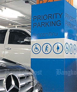 Driving inequality: Wealthy people often bribe security guards to use the prioirty parking spots in shopping centres, where one in every hundred spaces are supposed to be reserved for those in need.