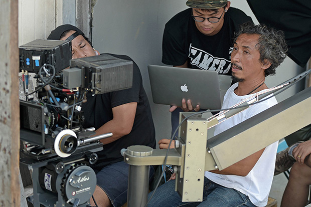 Crew members working on the set of the shooting of a sequence of an advert for a Thai bank promoting a scholarship fund in November. (AFP photo) Crew members working on the set of the shooting of a sequence of an advert for a Thai bank promoting a scholarship fund in November. (AFP photo)