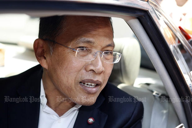 In this file photo, Watana Muangsook greets reporters before reporting himself to the NCPO in June 2015. (Bangkok Post file photo)