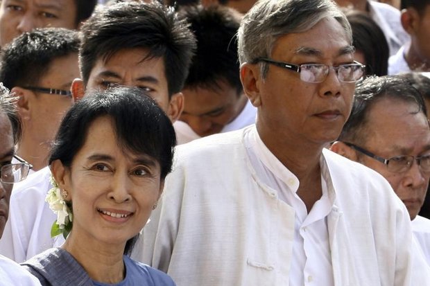 Loyalist and Oxford graduate Htin Kyaw (right) will serve Aung San Suu Kyi as president or vice-president, allowing her to pull Myanmar's strings behind the scenes. (EPA photo)