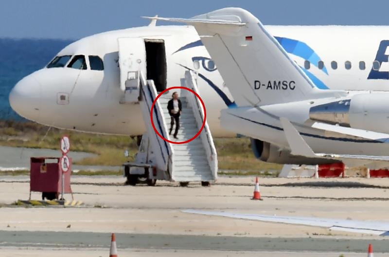 A man believed to be the hijacker of the EgyptAir Airbus A-320 diverted to Cyprus leaves the plane. He surrendered to security forces after a six-hour standoff on the tarmac at Larnaca. (AFP photo) A man believed to be the hijacker of the EgyptAir Airbus A-320 diverted to Cyprus leaves the plane. He surrendered to security forces after a six-hour standoff on the tarmac at Larnaca. (AFP photo)