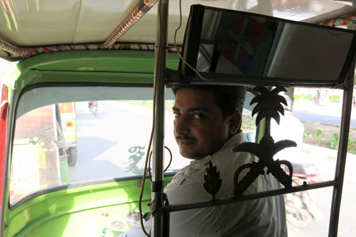 Imran Rind Rickshaw Bangkok Post - Uber's upstart rival in Pakistan uses rickshaws, low ...