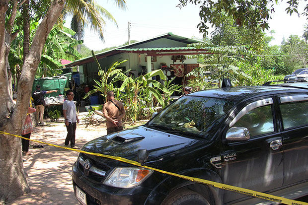 Police seal the crime scene at a Cha-am home as they search for evidence into the fatal shooting of a Swedish man at Kennel Scandinavia. (Photo by Chaiwat Satyaem)