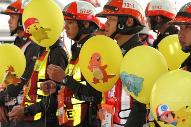 Police were given balloons and orders to find all 'Pokemon Go' players on major roads, allegedly because of all the accidents being caused. (Photo by Wichan Charoenkiatpakul)