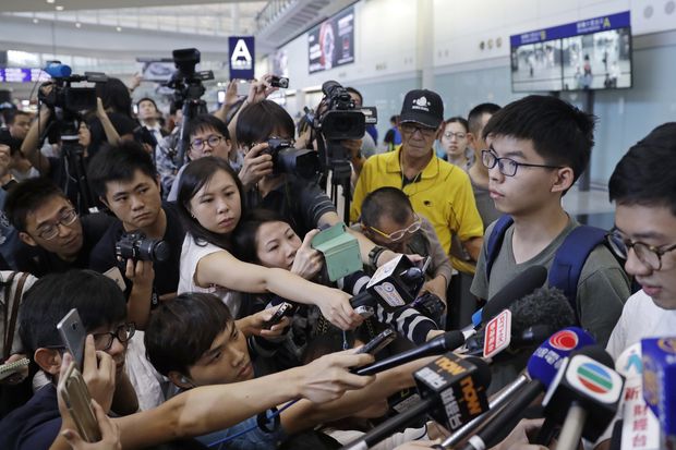 Teen activist back in Hong Kong after Thailand denies entry