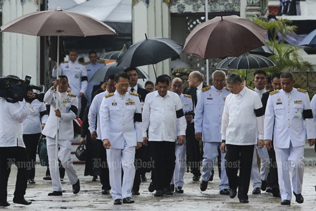 Philippine President Rodrigo Duterte arrives at the Grand Palace on Wednesday to pay respects to King Bhumibol Adujyadej at the Dusit Maha Prasat Throne Hall. (Photo by Patipat Janthong)