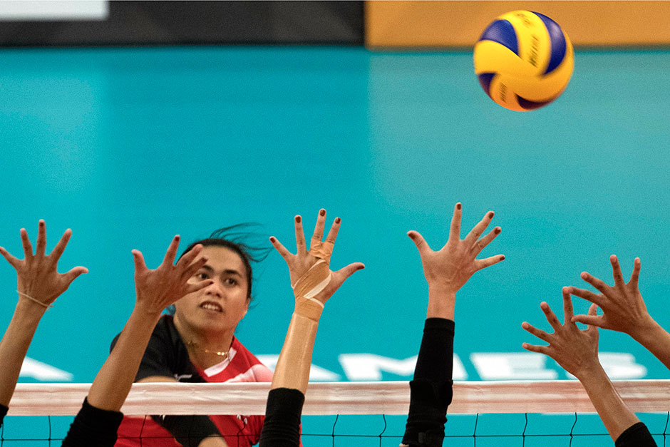 Hangestri Pertiwi Megawati of Indonesia is in action against Thailand in the SEA Games 2017 Women's Volleyball preliminary round event in Kuala Lumpur. The Thais won 3-0 (25-18, 25-16, 25-10). — EPA