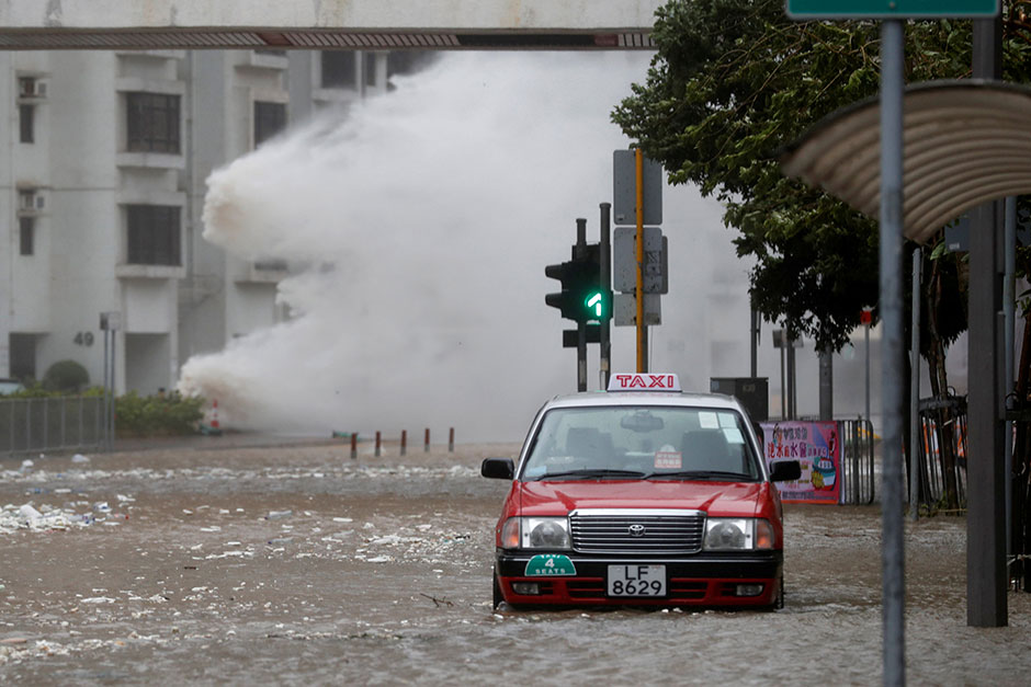 Typhoon Hato barrels into Hong Kong, forcing offices and schools to close and leaving flooded streets, shattered windows and hundreds of canceled flights in its wake. — Reuters