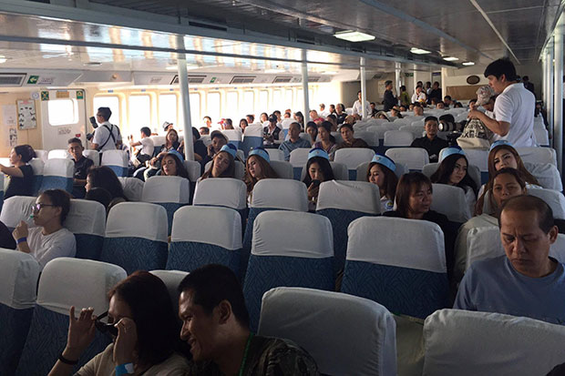 Passengers are on board the Royal 1 ferry for the first service between Pattaya and Hua Hin, which did not leave the Bali Hai pier. (Photo by Chaiyot Pupattanapong)