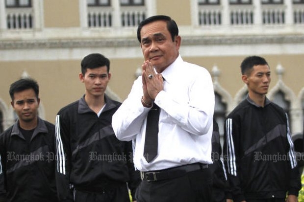 PM 'sorry' for putting tail on Yingluck