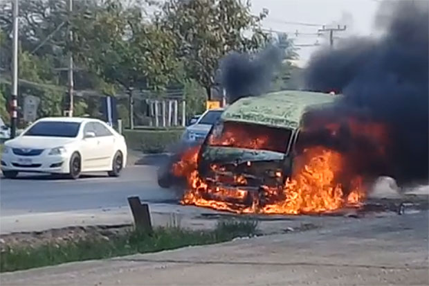 Empty passenger van on fire, driver escapes