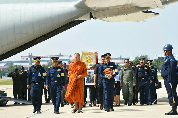 The body of Sqd Ldr Dilokrit Pattavee arrives at the Royal Thai Air Force base on Sunday. (Royal Thai Air Force photo)