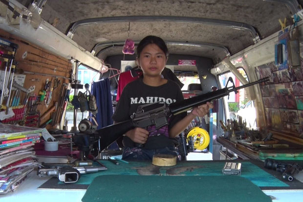 Introducing a 12-year-old gun-cleaning girl