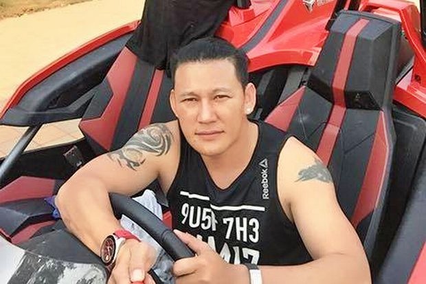 Accused drug kingpin Xaysana Keopimpha is seen sitting in one of several Lamborghini cars he owned, one of which police say is directly linked to flamboyant Thai race-car driver and 'person of interest' Akarakit Worarojcharoendet. (Photo via Facebook) Accused drug kingpin Xaysana Keopimpha is seen sitting in one of several Lamborghini cars he owned, one of which police say is directly linked to flamboyant Thai race-car driver and 'person of interest' Akarakit Worarojcharoendet. (Photo via Facebook)