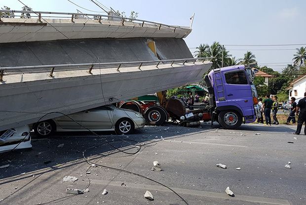 Highway overpass collapses when hit by truck