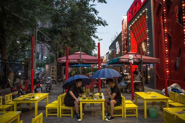 Storms disrupt Beijing flights, flash floods warned