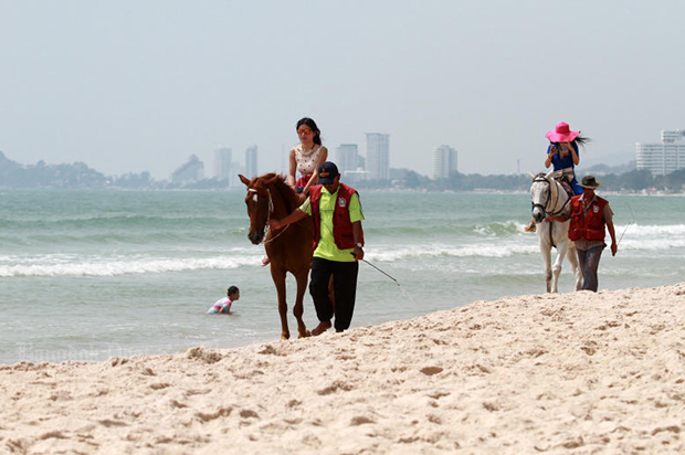 Horse riding on Hua Hin beach, a popular activity for domestic and international tourists. (Bangkok Post file photo)