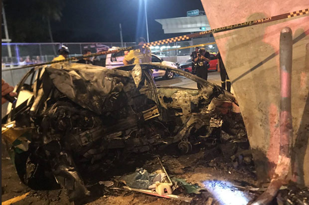 Two die in fiery inferno when taxi slams into pillar