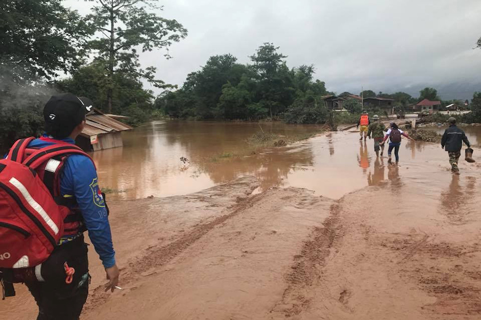 Rescue workers try to reach the flood victims on Thursday. — Rescue 1623/Reuters