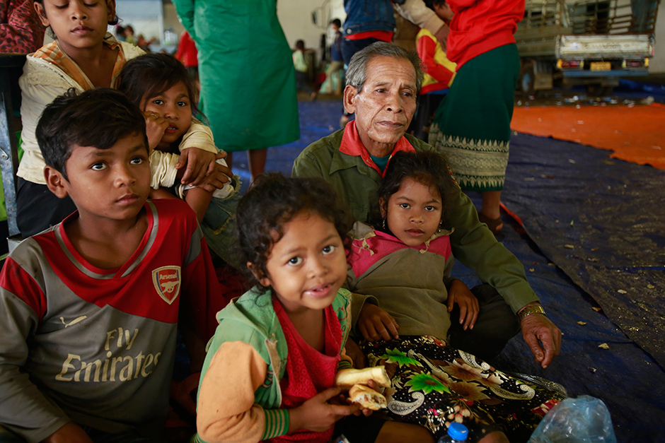 Laotians take refuge at a shelter in Pak Song town, Champassak province, on Wednesday. — AP