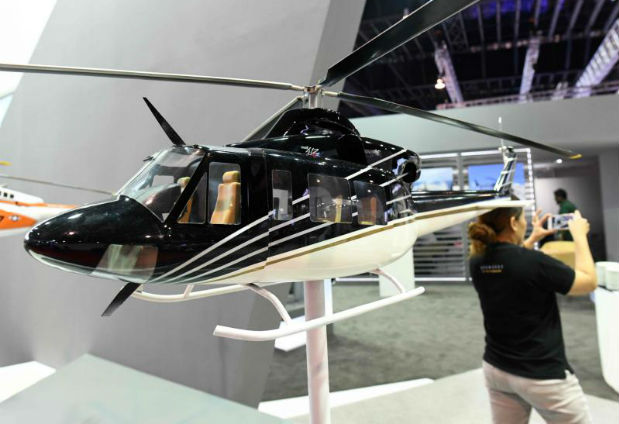 A model of a Bell 412 helicopter is display during the Singapore Airshow on Wednesday. (AFP photo)