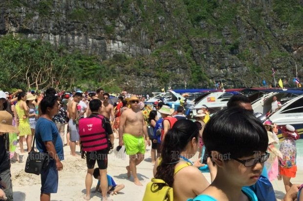 Hat Noppharat Thara-Mu Koh Phi Phi in Krabi province is the country's most popular Marine National Park, generating more than 1.5 million baht a day in entrance fees - and is wilting under the number of daily visitors. (File photo by Anchalee Kongrut)