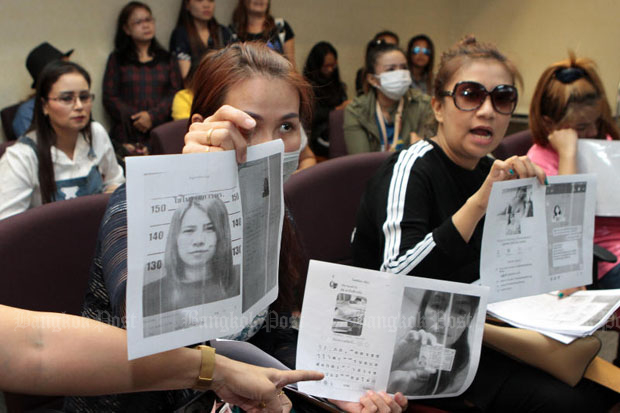 About 40 women show up at the Anti Human Trafficking Division in Bangkok on Thursday to file a complaint about job placement fraud they say cost them about 1 million baht. (Photo by Tawatchai Kemgumnerd) About 40 women show up at the Anti Human Trafficking Division in Bangkok on Thursday to file a complaint about job placement fraud they say cost them about 1 million baht. (Photo by Tawatchai Kemgumnerd)