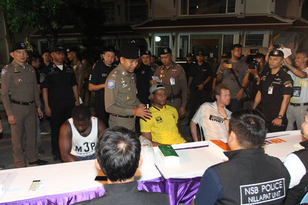 Pol Maj Gen Surachet Hakpal, deputy commissioner of tourist police, oversees the interrogation of foreign suspects at a hotel in Bangkok, one of 118 locations raided nationwide early on Thursday. (Police photo) Pol Maj Gen Surachet Hakpal, deputy commissioner of tourist police, oversees the interrogation of foreign suspects at a hotel in Bangkok, one of 118 locations raided nationwide early on Thursday. (Police photo)
