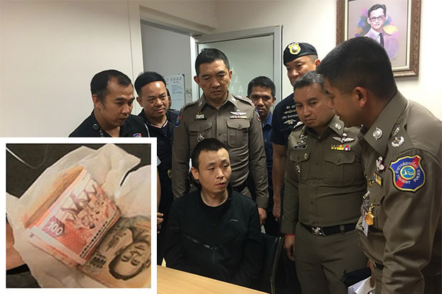 Chinese national Xu Xueliang, 32, is interrogated over the in-flight theft of cash from another passenger after being arrested at Suvarnabhumi airport on arrival from Hong Kong on Wednesday evening. Cabin crew said he was found holding the money, wrapped in tissue paper (inset), in his right hand. (Photo by Sutthiwit Chayutworakan)