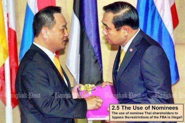 Stanley Kang, chairman of the Joint Foreign Chambers of Commerce in Thailand has a word with Prime Minister Prayut Chan-o-cha at a JFCCT dinner event which touched on the Foreign Business Act (FBA).